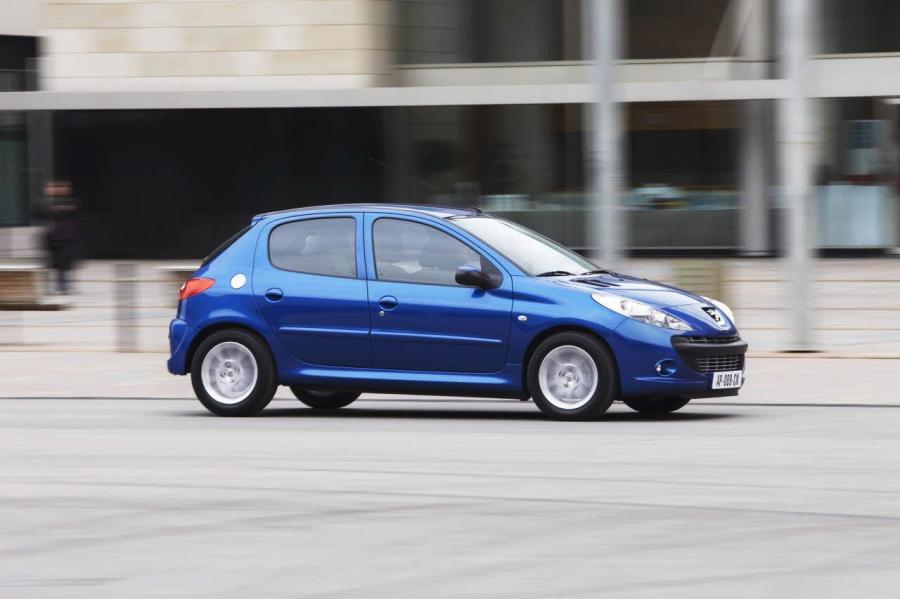  Peugeot 206 Plus 2009 года  (фото 11 из 49)